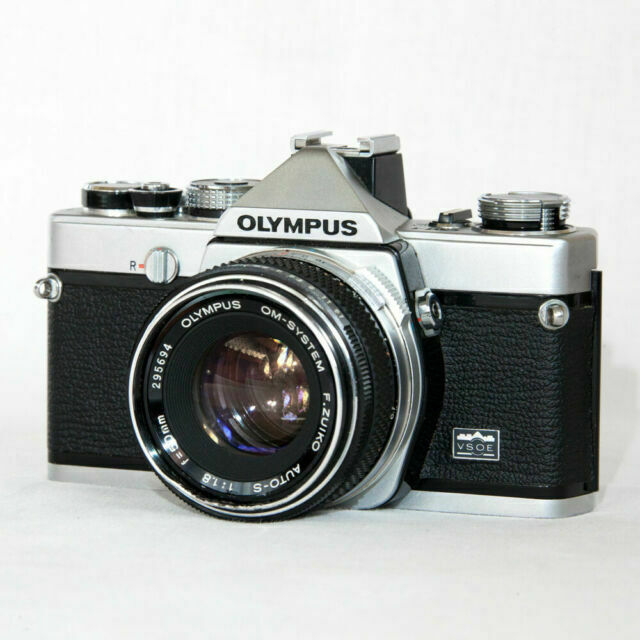 Olympus om 1 фотографии